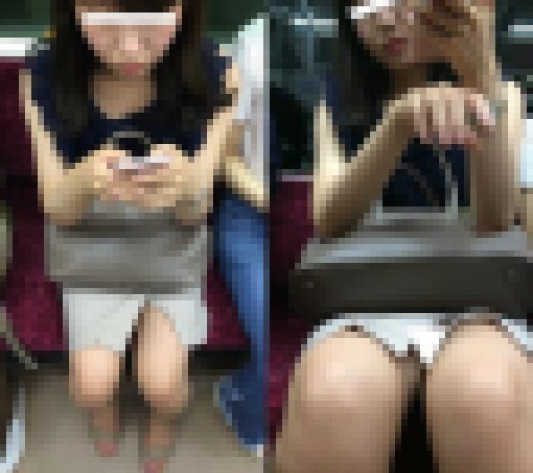 (電車対面）(顔出し)短い巻きつけスカートをお召になったロングヘアOLさん…スリットからチラチラ見えるパンストあんよの間を観察し サンプル画像